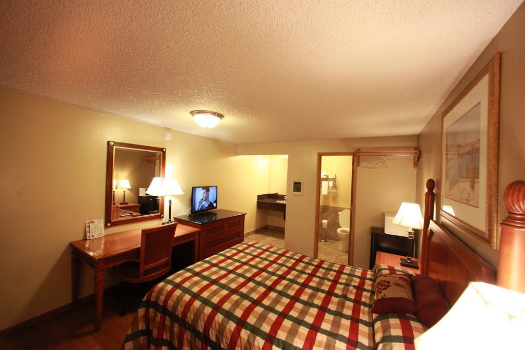 Executive Motel Γιουτζίν Δωμάτιο φωτογραφία